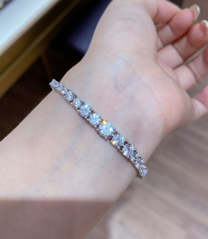 Elegant gradient Tennis 925 Silver Bracelet on a wrist