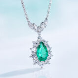 side view close-up of Sterling Silver Pear-Cut Green Cubic Zirconia Halo Pendant Necklace