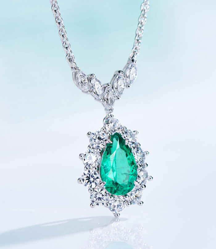 Sterling Silver Pear-Cut Green Cubic Zirconia Halo Pendant Necklace side view side view close-up of Sterling Silver Pear-Cut Green Cubic Zirconia Halo Pendant Necklace