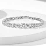 Sparkling 925 silver bracelet with a tennis-style design, featuring a full row of clear, round-cut stones which is gradient size