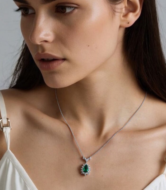 Sterling Silver Pear-Cut Green Cubic Zirconia Halo Pendant Necklace wearing effect Sterling Silver Pear-Cut Green Cubic Zirconia Halo Pendant Necklace worn on model'd necklace