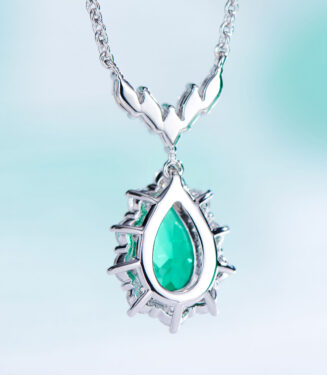 back view close-up of Sterling Silver Pear-Cut Green Cubic Zirconia Halo Pendant Necklace