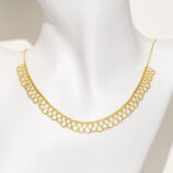 Exquisite gold-plated sterling silver collar necklace, featuring a intricate lace-like design with a scalloped edge, crafted with precision to create a delicate and feminine look, perfect for adding a touch of elegance to any outfit.