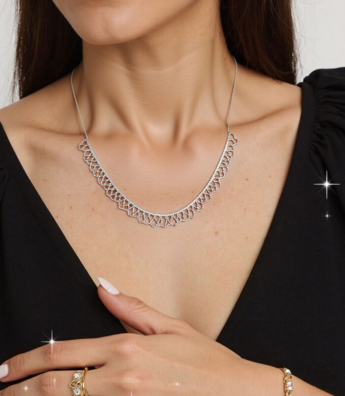 rhodium plated Sterling silver lace-trimmed necklace worn around model's neck