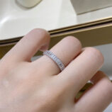 Rhodium plated Baguette-Cut Zirconia Sterling Silver Band Ring worn on a model's finger