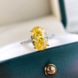 Luxury Yellow Gemstone Sterling Silver Ring displayed on a jewelry box
