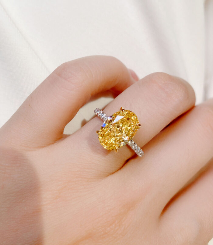 Luxury Yellow Gemstone Sterling Silver Ring worn on a model's finger