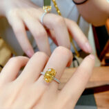 Luxury Yellow Gemstone Sterling Silver Ring displayed on a model's finger