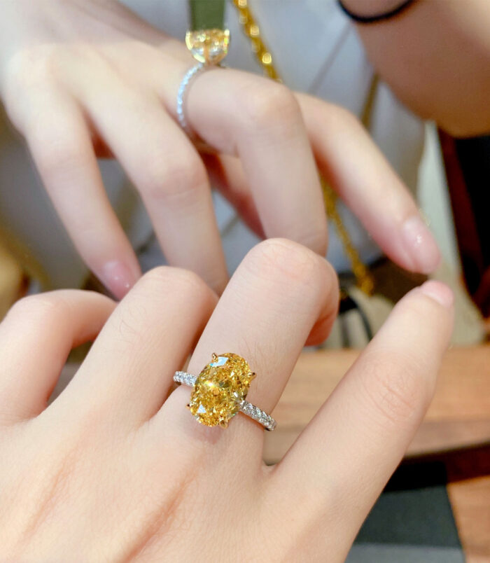 Luxury Yellow Gemstone Sterling Silver Ring displayed on a model's finger