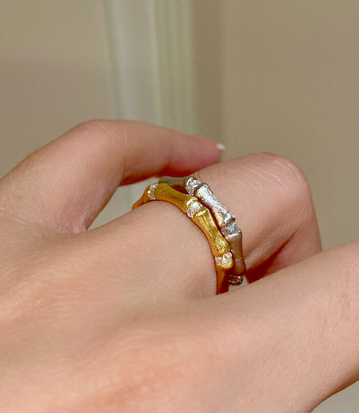 two-tone Nature-Inspired Bamboo Design Textured Sterling Silver Rings worn on model's finger
