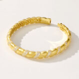 back view of gold plated vintage twisted brushed silver bracelet