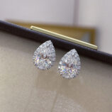 Sterling Silver Pear-Shaped Stud Earrings displayed in jewelry box