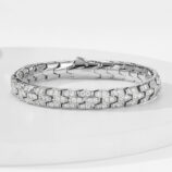 925 sterling silver bracelet with hexagonal pattern and cubic zirconia stones, polished finish, AG925 stamp visible on inner side.