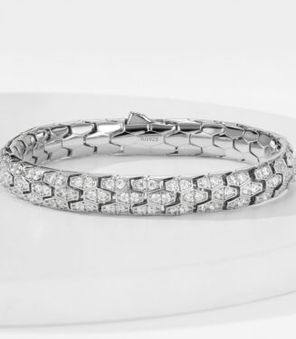 925 sterling silver bracelet with hexagonal pattern and cubic zirconia stones, polished finish, AG925 stamp visible on inner side.