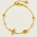 Gold-plated silver bracelet with orange and white cubic zirconia accents, adjustable chain