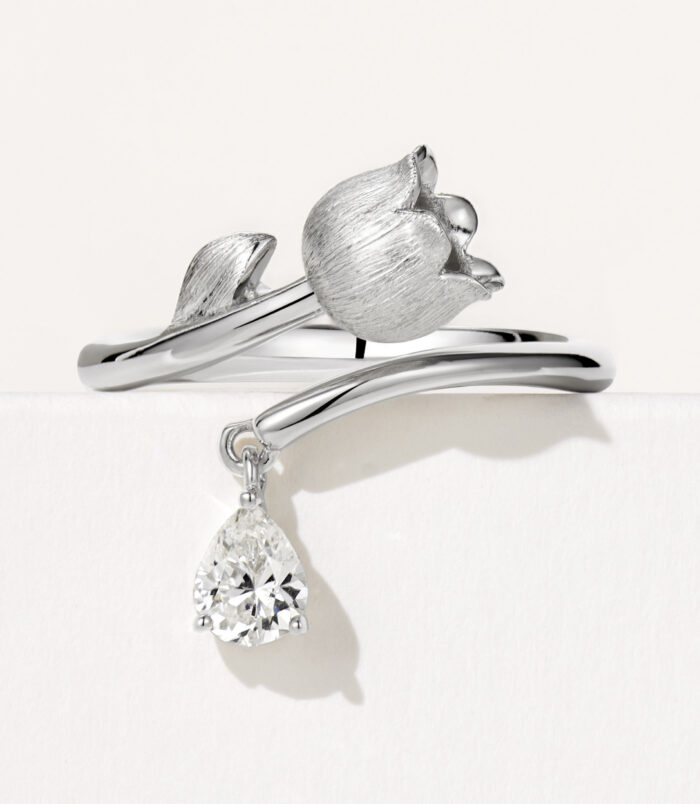front side close-up of Symbolic Lily of the Valley Sterling Silver Ring with Zircon drop