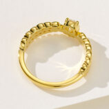 back side close-up of tiny Leaf crown zirconia ring