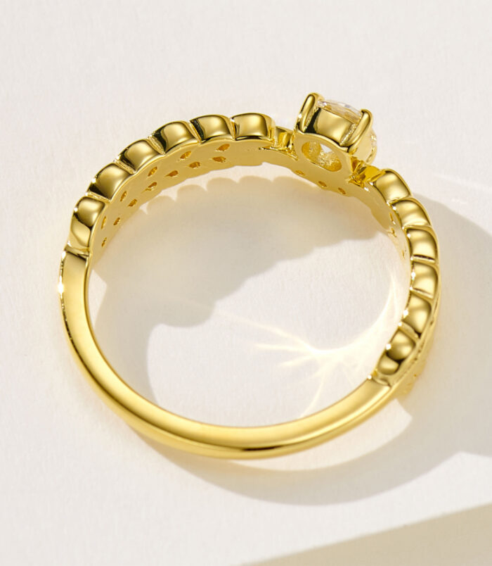 back side close-up of tiny Leaf crown zirconia ring