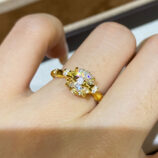 18K Gold-Plated Sterling Silver Ring with Round Zircon Stone worn on a model's finger