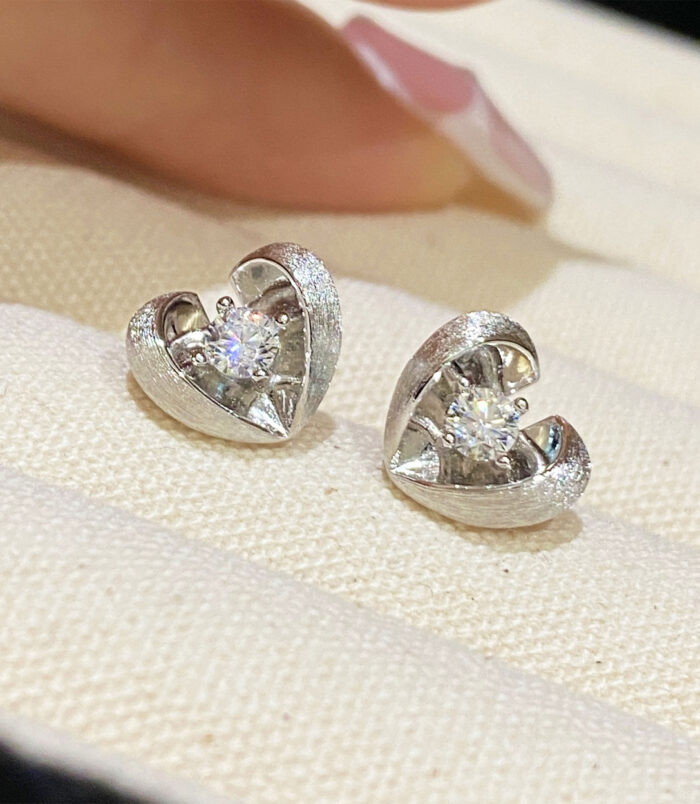 Sterling Silver Brushed Rhodium-Plated Heart Stud Earrings jewelry box display Sterling Silver Brushed Rhodium-Plated Heart Stud Earrings on a jewelry box