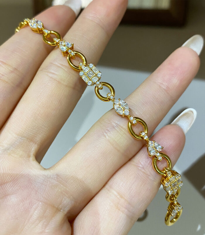 handheld close-up of 925 silver multi-cut diamond bracelet