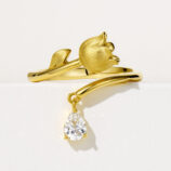 Elegant sterling silver ring with a delicate lily of the valley design, featuring a polished finish and sparkling cubic zirconia accents, symbolizing purity and happiness.