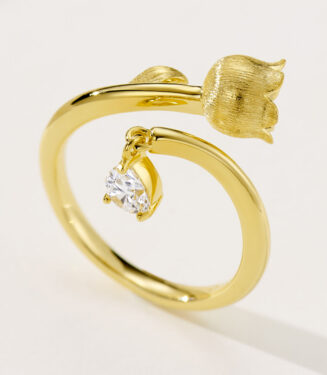 side view close-up of Symbolic Lily of the Valley Sterling Silver Ring with Zircon drop