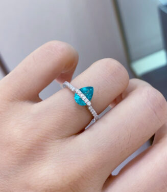Pear-Shaped Paraiba Sterling Silver Ring worn on a model's finger