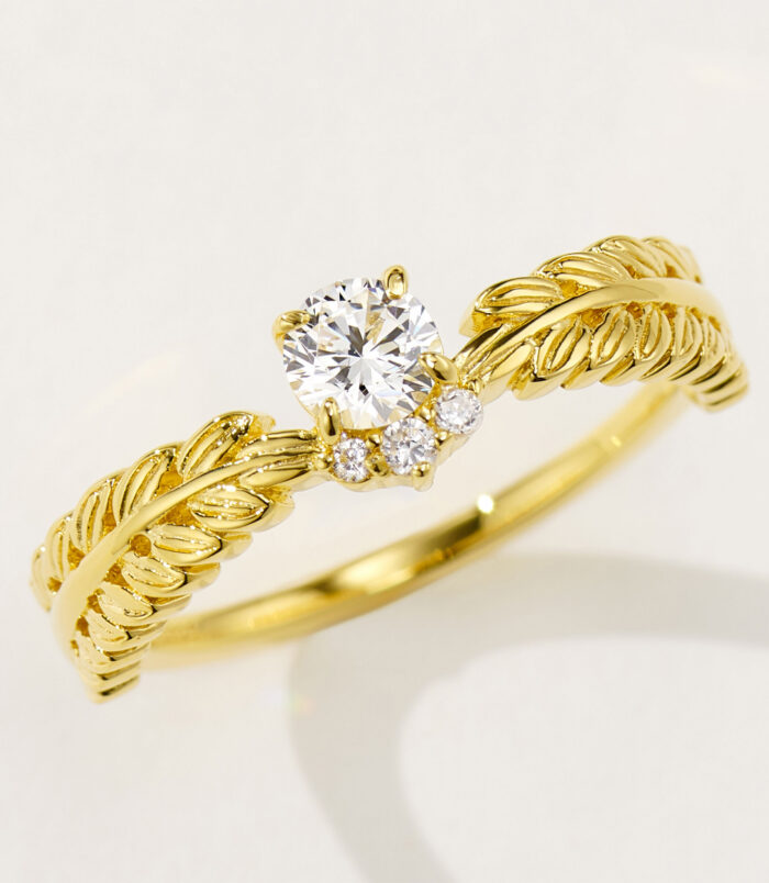 side view close-up of tiny Leaf crown zirconia ring