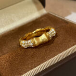 18k gold plated Sterling Silver zirconia Bamboo Ring on a jewelry box