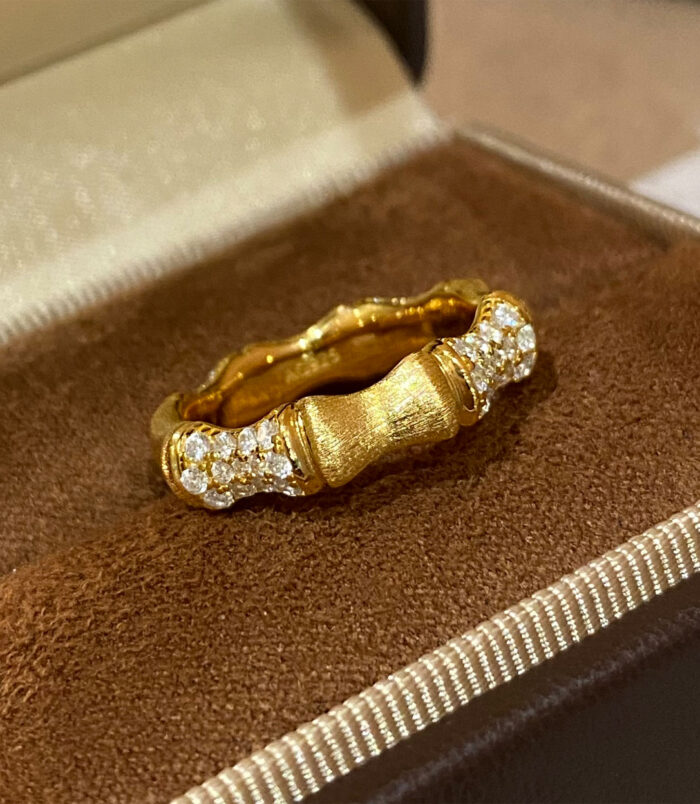 18k gold plated Sterling Silver zirconia Bamboo Ring on a jewelry box