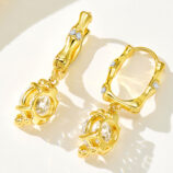 back view close up of Sterling silver with bamboo-shaped zirconia Huggie Hoop Earrings