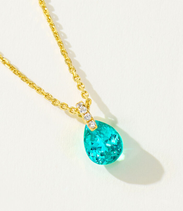 side view close-up of gold plated Minimalist Sterling Silver Pear-Shaped Paraiba Necklace