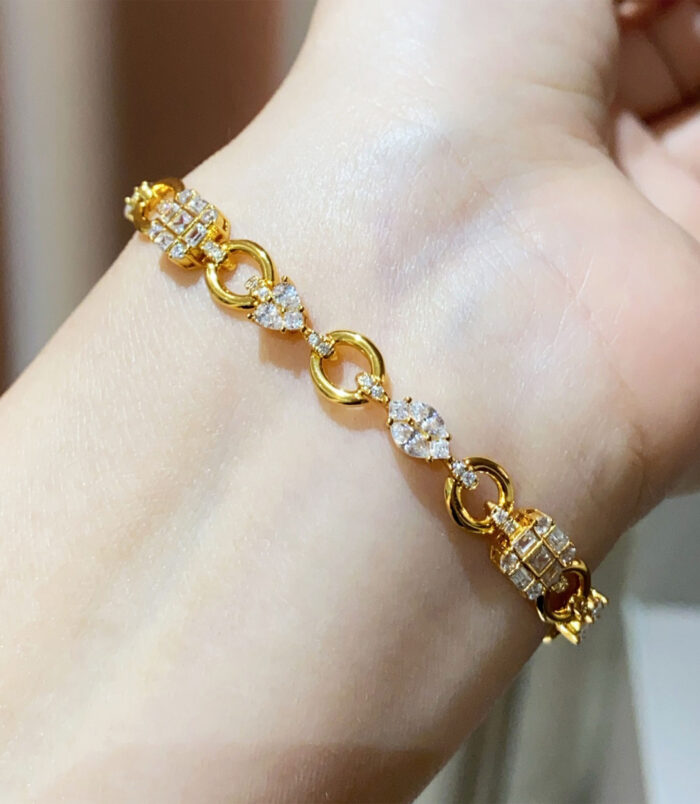 925 silver multi-cut diamond bracelet worn on wrist, featuring alternating round and baguette-cut diamond accent