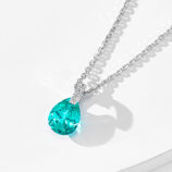 side view close-up of Rhodium plated Minimalist Sterling Silver Pear-Shaped Paraiba Necklace