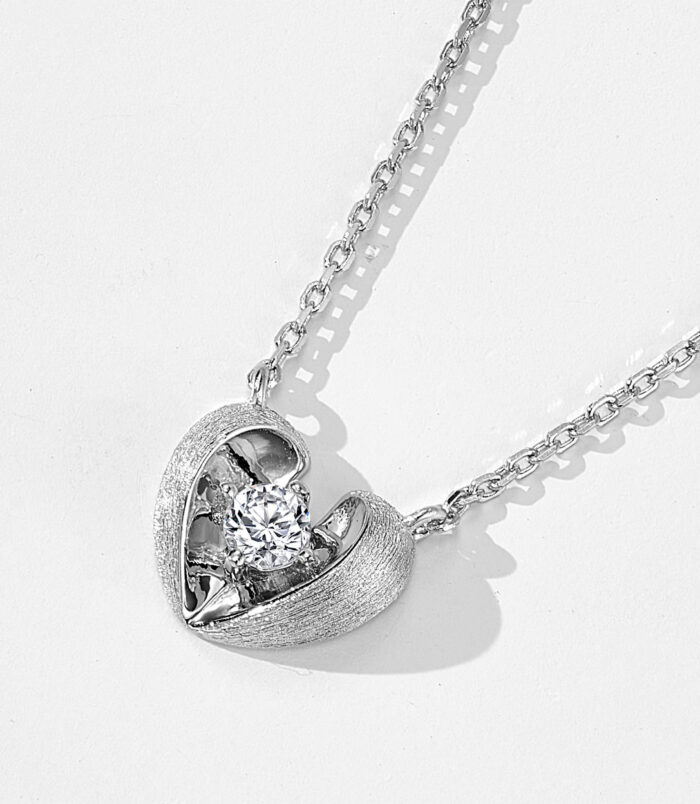 Rhodium plated 925 Sterling Silver Brushed Heart Necklace side view side view close-up of Rhodium plated 925 Sterling Silver Brushed Heart Necklace
