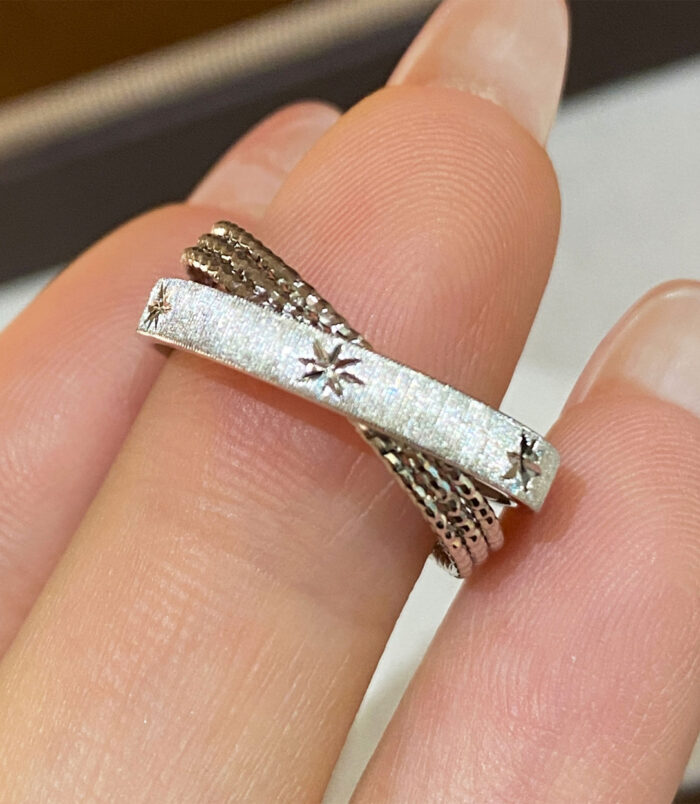 Rhodium plated Sterling Silver Star Engraved Textured Bands handheld details hand held details of Rhodium plated Sterling Silver Star Engraved Textured Bands