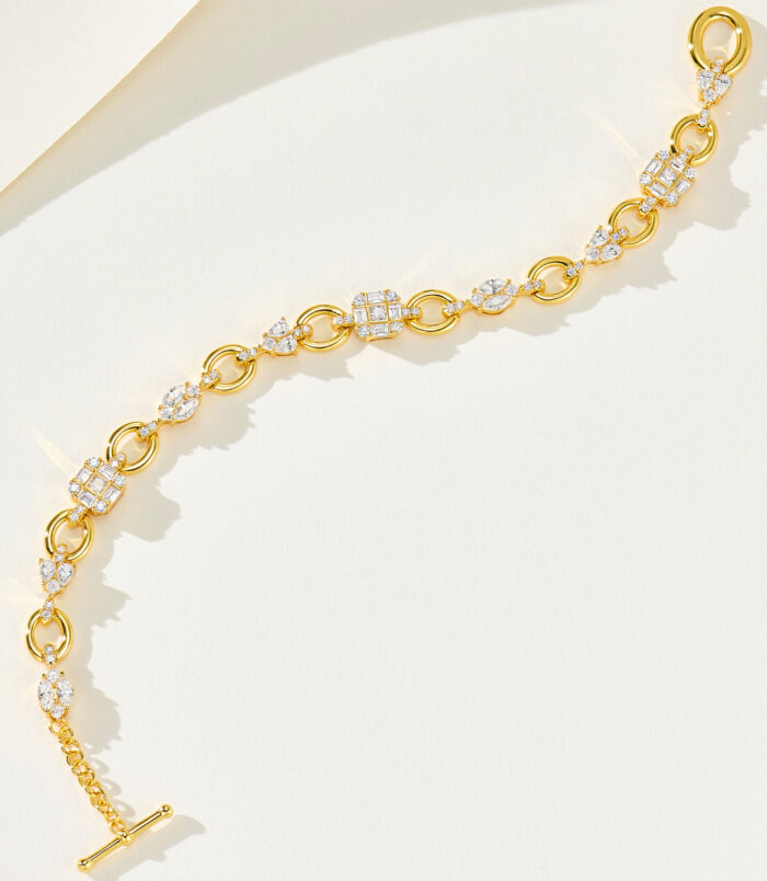18K yellow gold link bracelet with multi-cut diamond accents and adjustable toggle clasp, available in 16cm (7.4g) and 17.5cm (8.1g) sizes