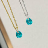 Minimalist Sterling Silver Pear-Shaped Paraiba Necklace color comparison:white gold color vs. yellow gold color