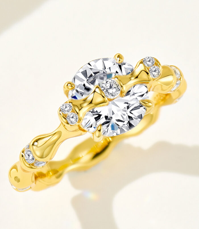 Luxury 18K Gold-Plated Sterling Silver Ring with Round Zircon Stone 18K gold-plated sterling silver ring with a large round-cut zircon stone and small diamond accents, presenting an elegant and luxurious look.