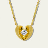 Romantic gold-plated sterling silver heart-shaped pendant necklace featuring a round brilliant-cut white cubic zirconia stone at the center, set in a unique split-heart design with a brushed finish, creating a charming and eye-catching look perfect for expressing love and adding a touch of elegance to any outfit.