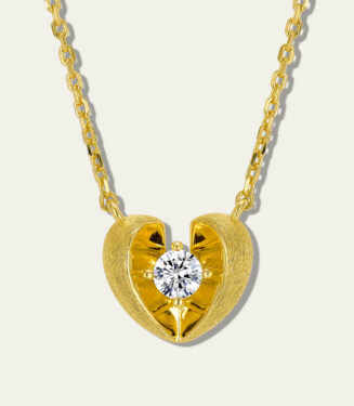 Romantic gold-plated sterling silver heart-shaped pendant necklace featuring a round brilliant-cut white cubic zirconia stone at the center, set in a unique split-heart design with a brushed finish, creating a charming and eye-catching look perfect for expressing love and adding a touch of elegance to any outfit.