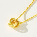 side view close-up of Modern Gold-Plated Sterling Silver Knot Pendant Necklace