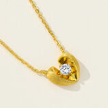 side view close-up of gold plated 925 Sterling Silver Brushed Heart Necklace