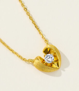 side view close-up of gold plated 925 Sterling Silver Brushed Heart Necklace