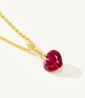 side view close-up of Charming Sterling Silver Heart-Shaped Red Zirconia Stone Necklace