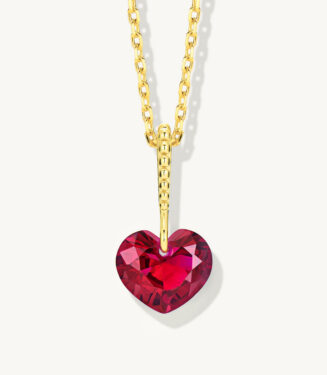 Romantic gold-plated sterling silver necklace featuring a heart-shaped brilliant-cut red cubic zirconia stone, suspended from a uniquely designed gold-plated sterling silver bail with a textured pattern, creating a charming and eye-catching look perfect for expressing love and adding a touch of elegance to any outfit.