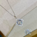 Dazzling Sterling Silver Snowflake Pendant Necklace reflected beautifully on a mirror