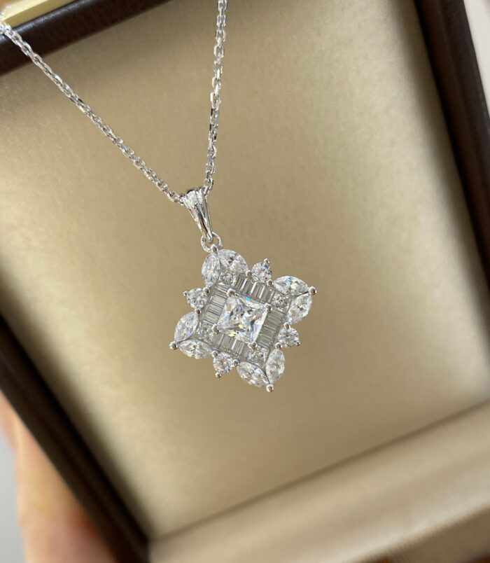 Dazzling Sterling Silver Snowflake Pendant Necklace displayed in jewelry box