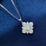 Dazzling Sterling Silver Snowflake Pendant Necklace display in dark blue jewelry box